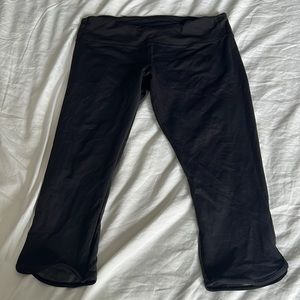 Lululemon running leggings with mesh behind legs and zip pocket on rear